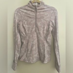 Lululemon 1/4 zip top. This is a size 8 BUT fits like a sz 6.
